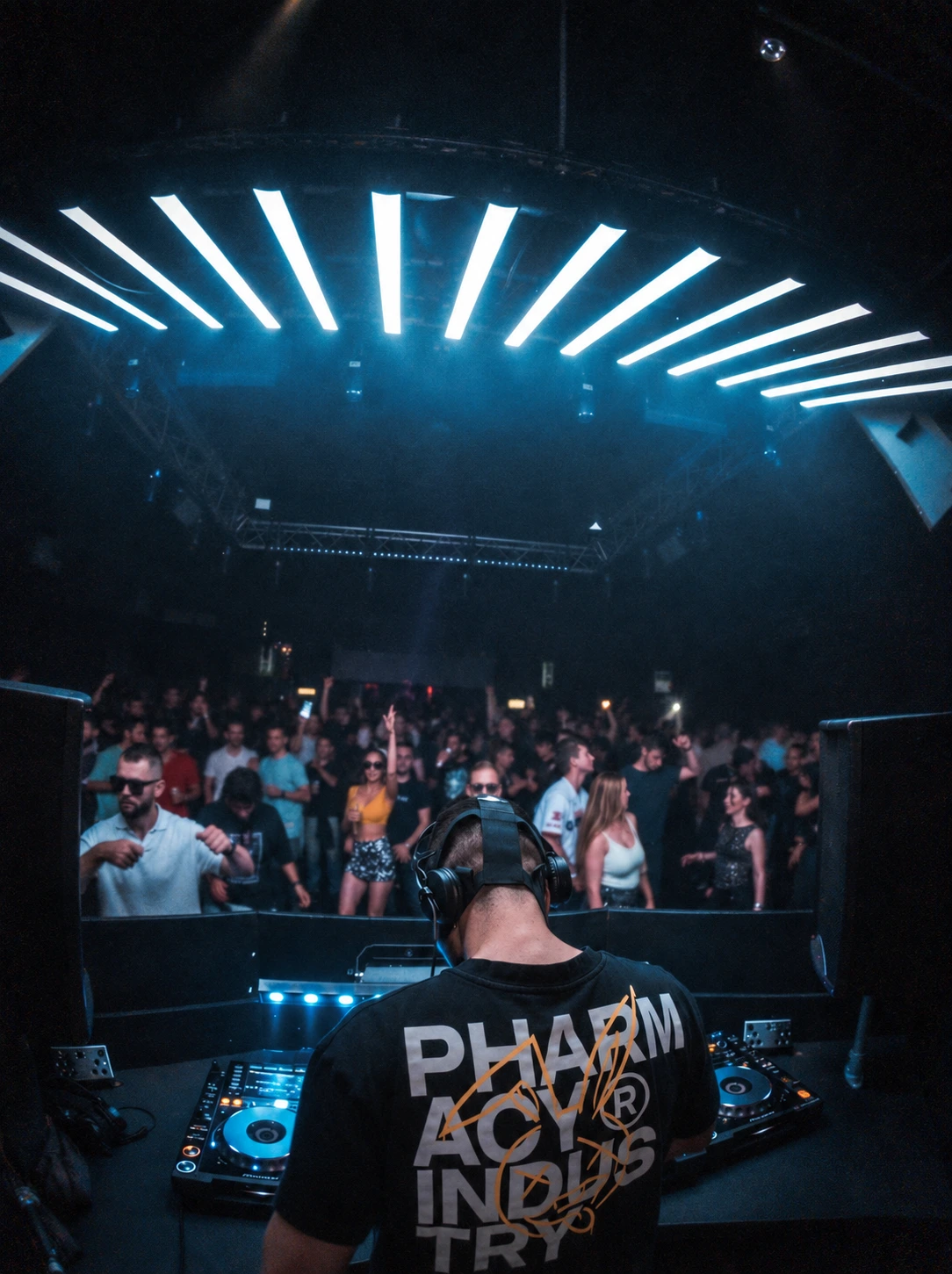 GR3GOR seen from behind the decks facing the crowd